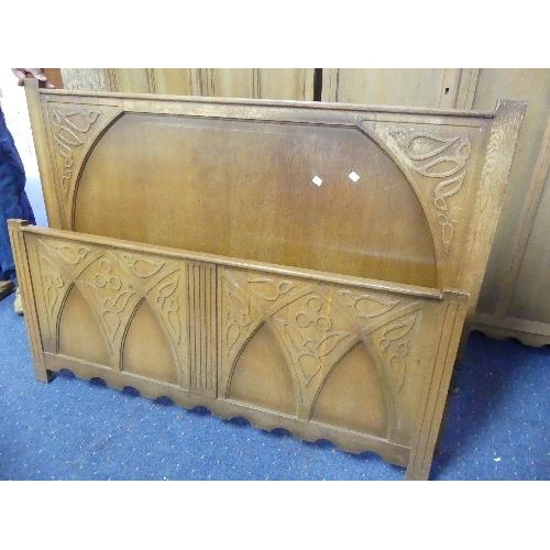 302 - A 1930's oak Bedroom Suite, comprising Triple and Double Wardrobes, Dressing Table, 4'6