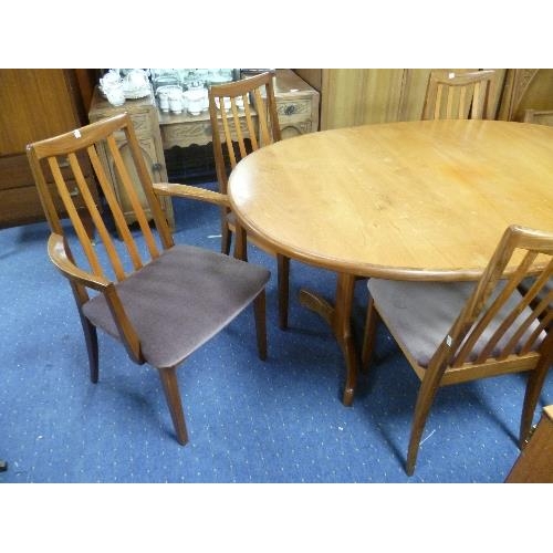 318 - A mid 20thC G-Plan teak extending Dining Table, together with six G-Plan dining chairs, including tw... 