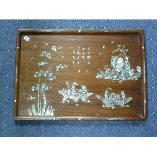 335 - An Oriental hardwood Tray, inlaid with mother-of-pearl, 21½in (55cm) wide, together with an Oriental... 