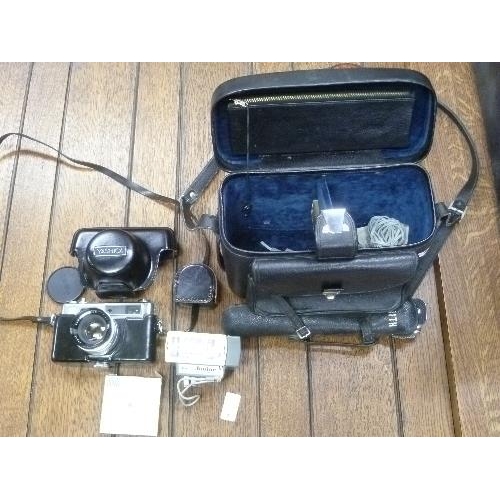 341 - A Yashika Electro 35 Camera, in fitted leather camera bag, with Zenith tripod, together with a retro... 