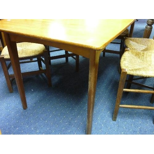 390 - A mid-20th century extending Dining Table, with one additional leaf, 54in (137cm) wide.