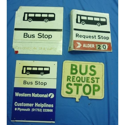 615 - Bus and Coaching Interest; a collection of four various bus stop flags, together with two bus stop t... 