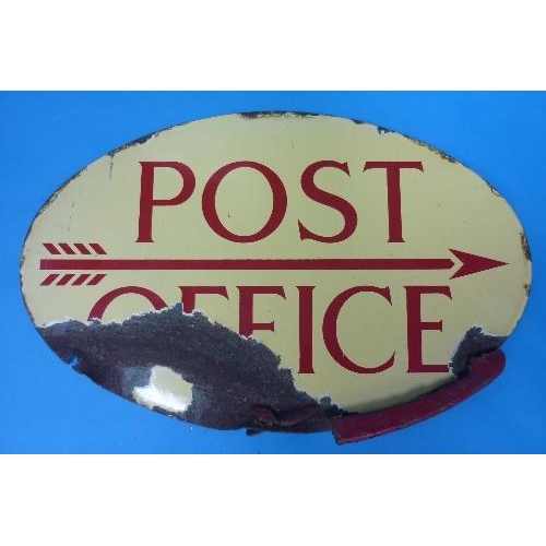 623 - A mid 20thC enamel double sided Post Office oval direction Sign, red lettering on cream ground, poor... 