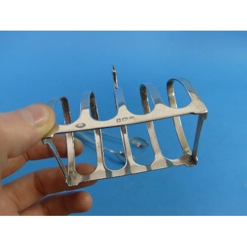 65 - A small George V silver five bar Toast Rack, by Adie Brothers Ltd, hallmarked Birmingham, 1931, toge... 