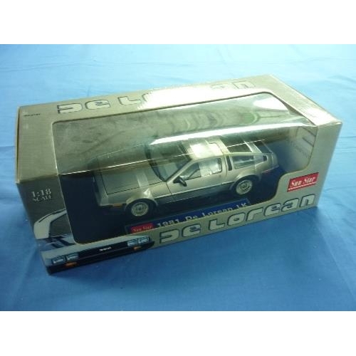 654 - A Sun Star 1:18 scale Model of 1981 De Lorean LK, no. 2701, in original packaging.