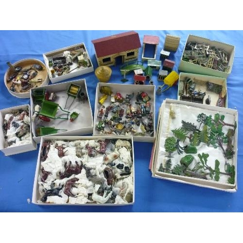 666 - A good quantity of lead farm figures and accessories, Britains and Johillco, including farmers and f... 