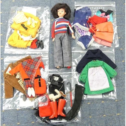 641 - A 1960's Pedigree Sindy Doll, brunette, made in Hong Kong, together with a quantity of Sindy labelle... 