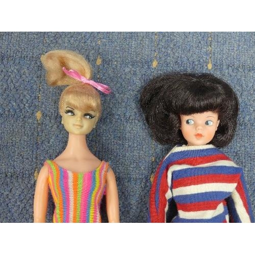 641 - A 1960's Pedigree Sindy Doll, brunette, made in Hong Kong, together with a quantity of Sindy labelle... 