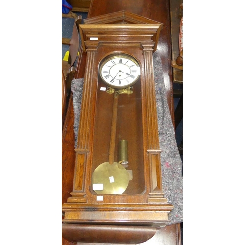 123 - An Edwardian oak Vienna Regulator Wall Clock, height 44in x width 15in (116cm x 38cm)