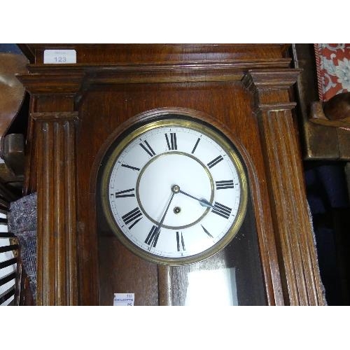 123 - An Edwardian oak Vienna Regulator Wall Clock, height 44in x width 15in (116cm x 38cm)