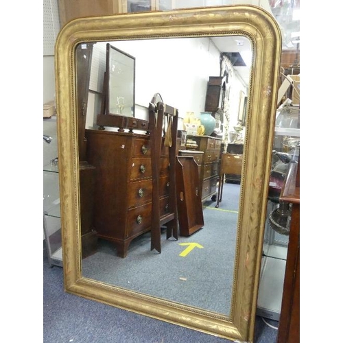 454 - A large French giltwood Wall Mirror, of rectangular form with rounded top, 39½in (100cm) wide, 55½in... 