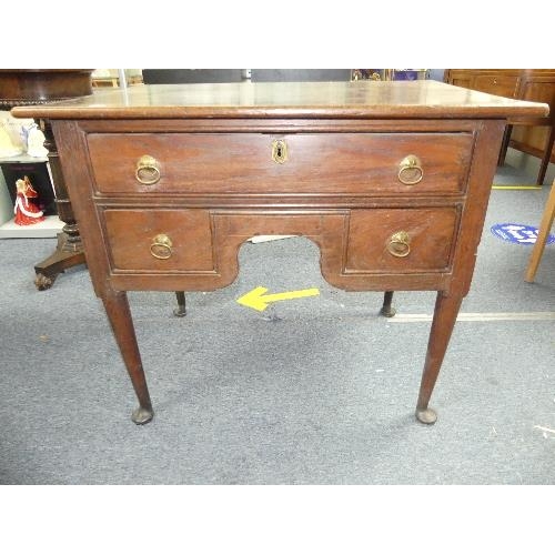 455 - A George III oak Lowboy, one long drawer above two short, the plain supports with pad feet, 34½in (8... 