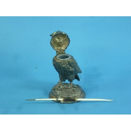 467 - A late 19thC/early 20thc Novelty Owl inkwell and pen holder, Britannia metal set with glass eyes (a ... 