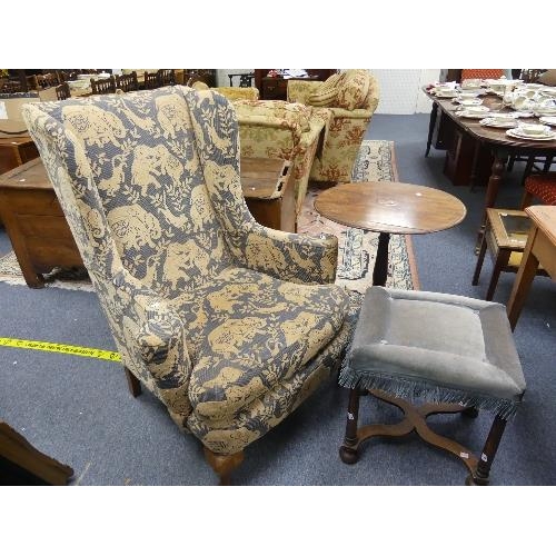 471 - A Wing Armchair, with blue / sand coloured 'elephant' upholstery, 43in (109cm) high x 34in (86.5cm) ... 