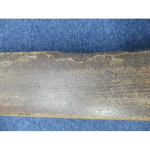 479 - An early 20th century oak Fire Fender, of large size, the shaped fender with plain square spindles a... 