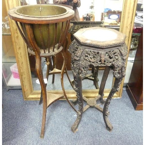 483 - An oriental carved rosewood Plant Stand, with octagonal marble top, 30in (76cm) high, together with ... 