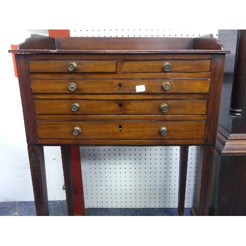 492 - A Victorian inlaid mahogany Work Table, with two short above three long narrow drawers, raised on sq... 