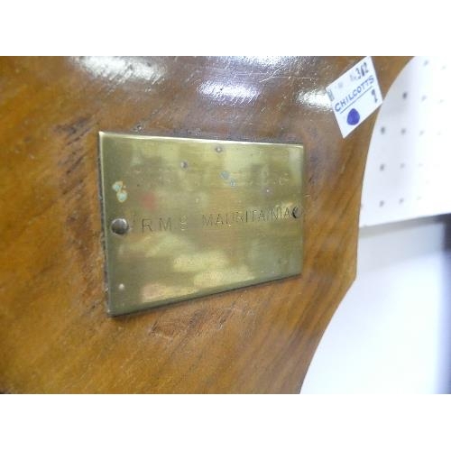 508 - R.M.S. Mauritainia interest: an early 20th century walnut cased barometer and thermometer, with bras... 