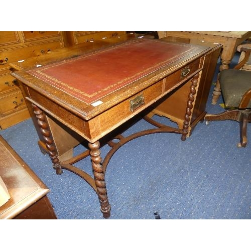 53 - A Victorian oak Lady's Desk, with inset leather top and barley twist supports, width 42in x depth 24... 