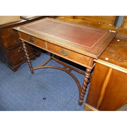 53 - A Victorian oak Lady's Desk, with inset leather top and barley twist supports, width 42in x depth 24... 