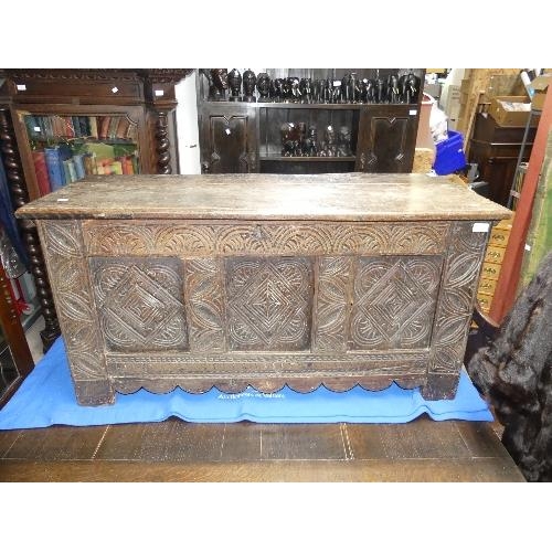 68 - An 18thC Carved oak triple panel Coffer, on style feet, width 46in x depth 19in x height 23in (116cm... 