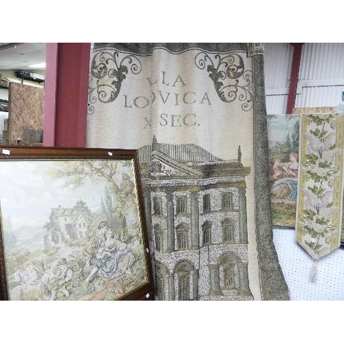 82 - A large tapestry wall hanging, depicting a large building within a swag border with the inscription ... 