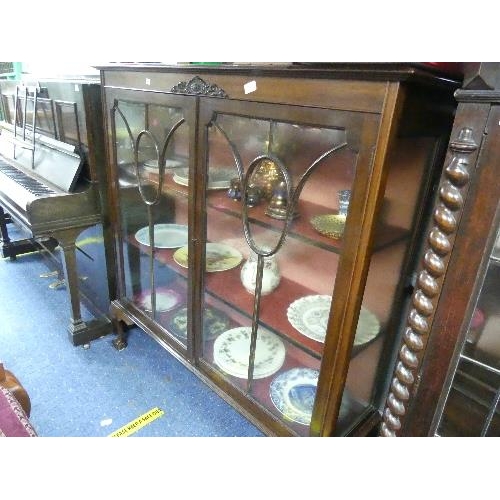 89 - An early 20th century astragal glazed display Cabinet, the two doors enclosing shelves, on claw and ... 