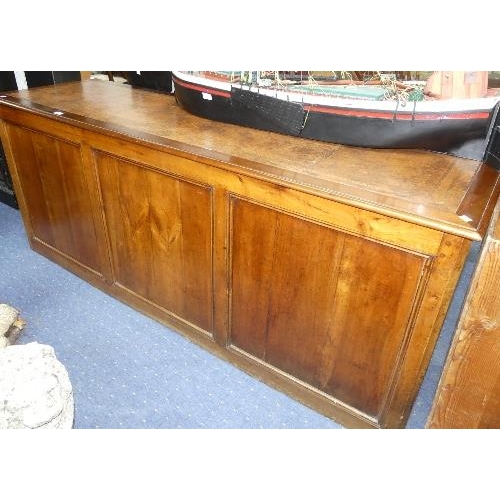 103 - A long Shop Counter, made of antique mahogany panels with leatherette inset top, width 78in x depth ... 