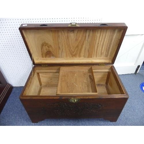 108 - A 20thC oriental carved camphor wood Chest, with engravings depicting dragons, width 40in x depth 19... 