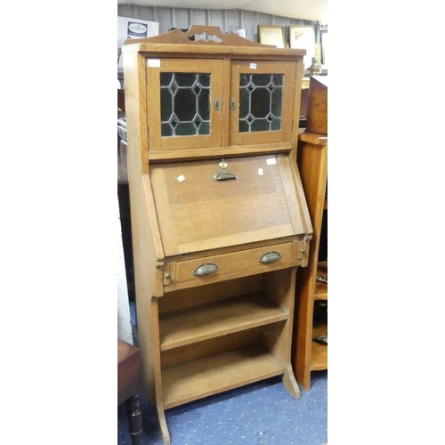 110 - An Arts and Crafts oak Upright Desk, with stained glass upon shelving and a drawer, width 28in x dep... 