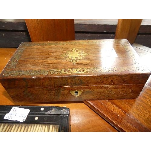 116 - Two Victorian mahogany and brass Bookslides, with brass decoration, together with three decorative b... 