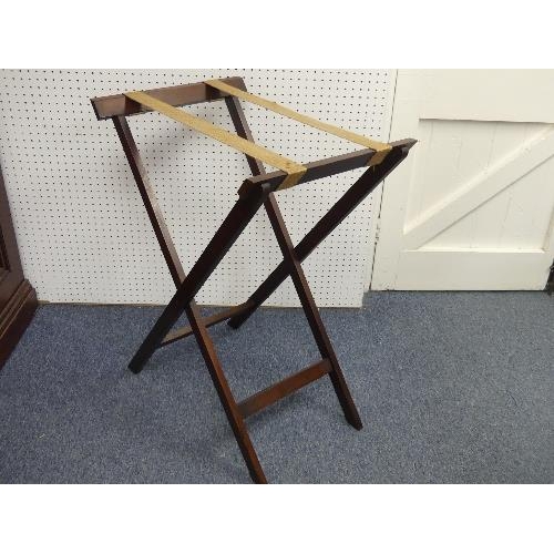 448 - A 19thC mahogany Butler's Tray, with kidney shaped apertures, on a folding stand, width 29in x depth... 