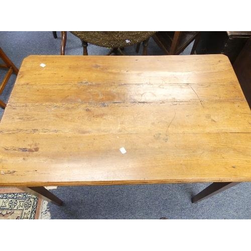 456 - An antique French cherry wood Side Table, the plank top with canted corners, chamfered square taperi... 