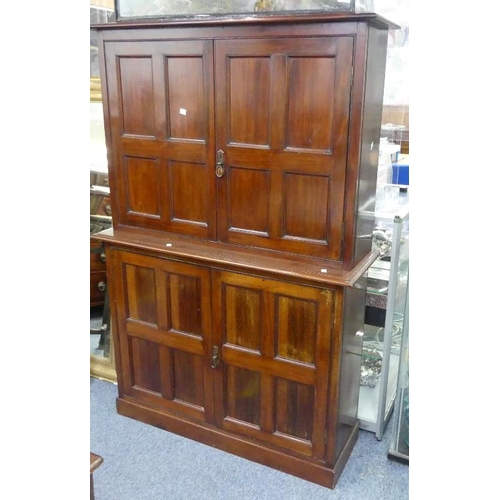 459 - An Edwardian mahogany two part Cabinet, each with panelled doors enclosing shelves, 41in (104cm) wid... 