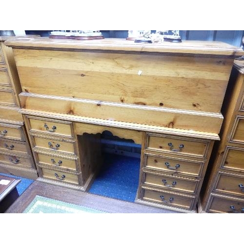 47 - A modern good quality pine bedroom Suite, comprising a pair of bedside chests of drawers, a kneehole... 