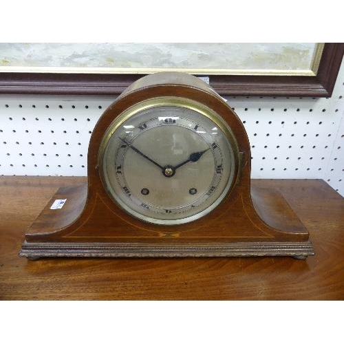 472 - A mahogany cased 'Napoleon Hat' Mantle Clock, with pendulum and key, 14½in (37cm) wide.