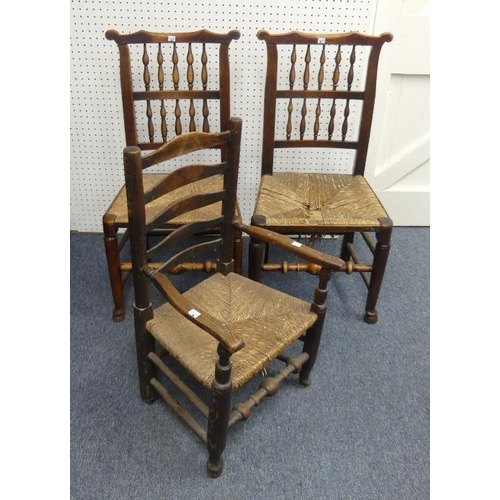 476 - A set of seven ash and elm spindle-back country farmhouse dining chairs, with rush seats, together w... 