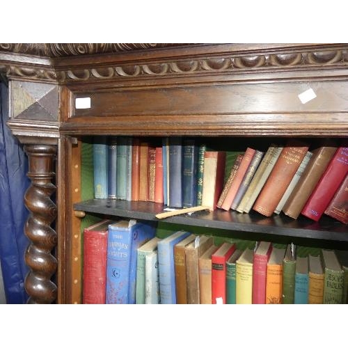 70 - A Victorian oak glazed Bookcase, with central glazed door and fitted shelves, flanked by barley-twis... 