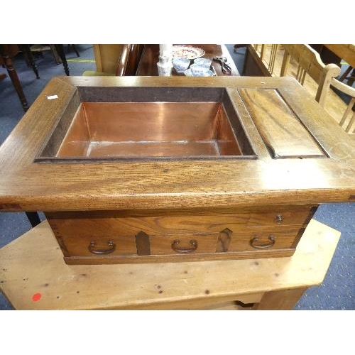 77 - An unusual Oriental (?) floor Chest, the top with sunken copper 'bath' and separate lidded compartme... 