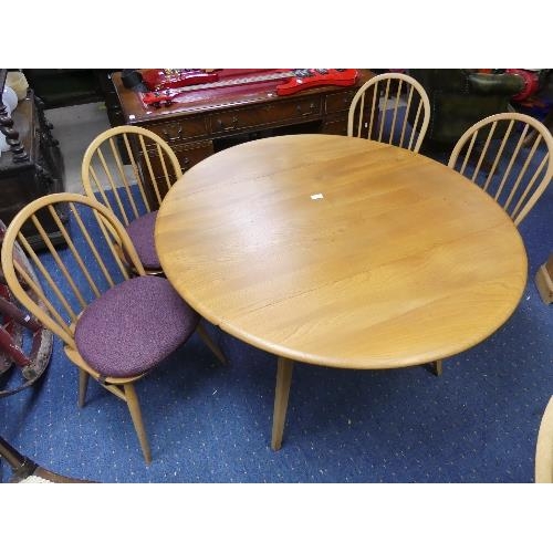 81 - Ercol: a set of four vintage 1960s retro Ercol Quaker design blonde beech and elm wood hoop back cha... 