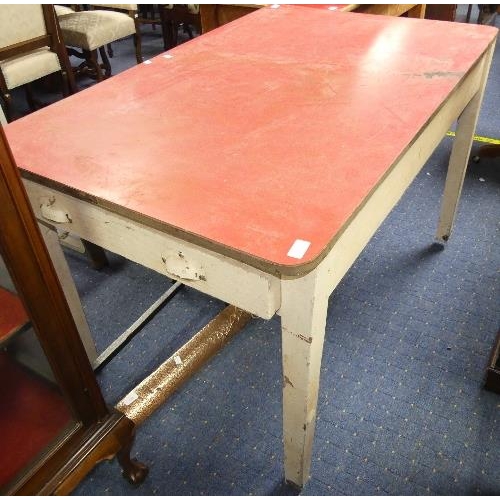 92 - An early 20thC white painted pine Kitchen Table, with a drawer each end and red melamine top, width ... 