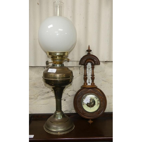 95 - An Edwardian brass Oil Lamp, with funnel and white glass shade, together with an Edwardian oak cased... 