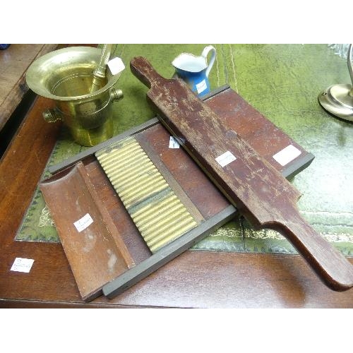 96 - An Antique brass bound pill roller, together with a powder chopper and pestle and mortar (4)