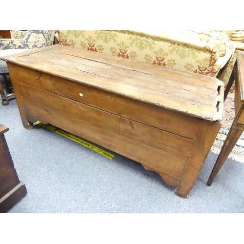 509 - An antique provincial Chest, the hinged four-plank with cleated ends, on stile supports, in distress... 