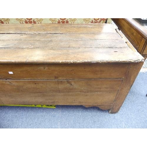 509 - An antique provincial Chest, the hinged four-plank with cleated ends, on stile supports, in distress... 