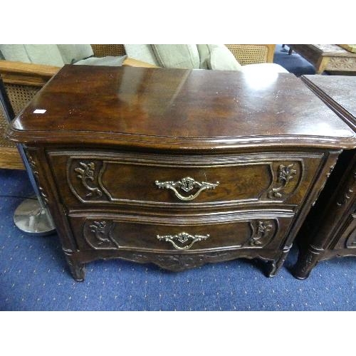 108 - A pair of American, Louis XVI-style, reproduction walnut Chest of Drawers, in a serpentine manor, co... 