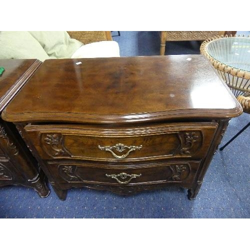 108 - A pair of American, Louis XVI-style, reproduction walnut Chest of Drawers, in a serpentine manor, co... 