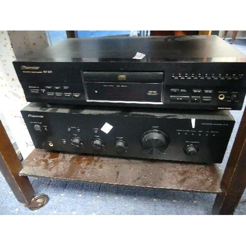 111 - A Pioneer PD 207 CD player, A10 integrated amplifier, and Garrard AT75 Turntable, together with a pa... 