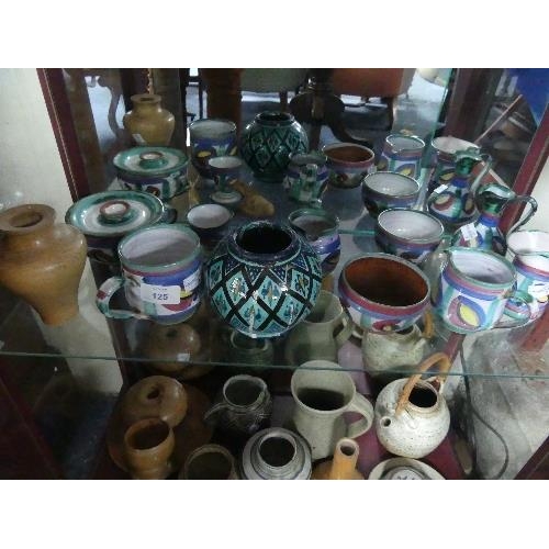 125 - A small quantity of Tintagel Pottery, all decorated in the 'Dragon Eye' pattern, comprising three ju... 