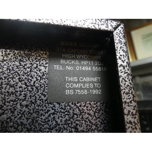 228A - A modern metal Gun Cabinet, by BOXX SECURITY, with two keys, complies to BS 7558-1992..